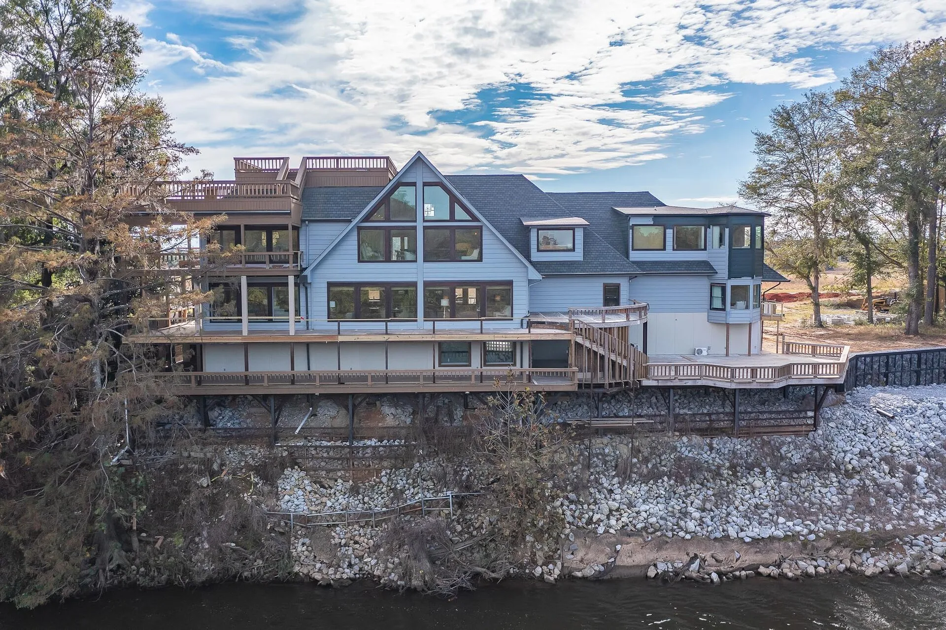 Aerial drone photography of a residential property and surrounding neighborhood